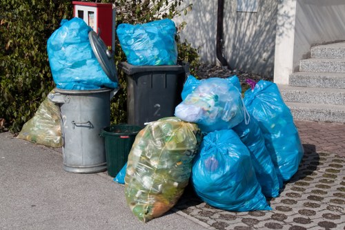 Professional movers handling furniture disposal
